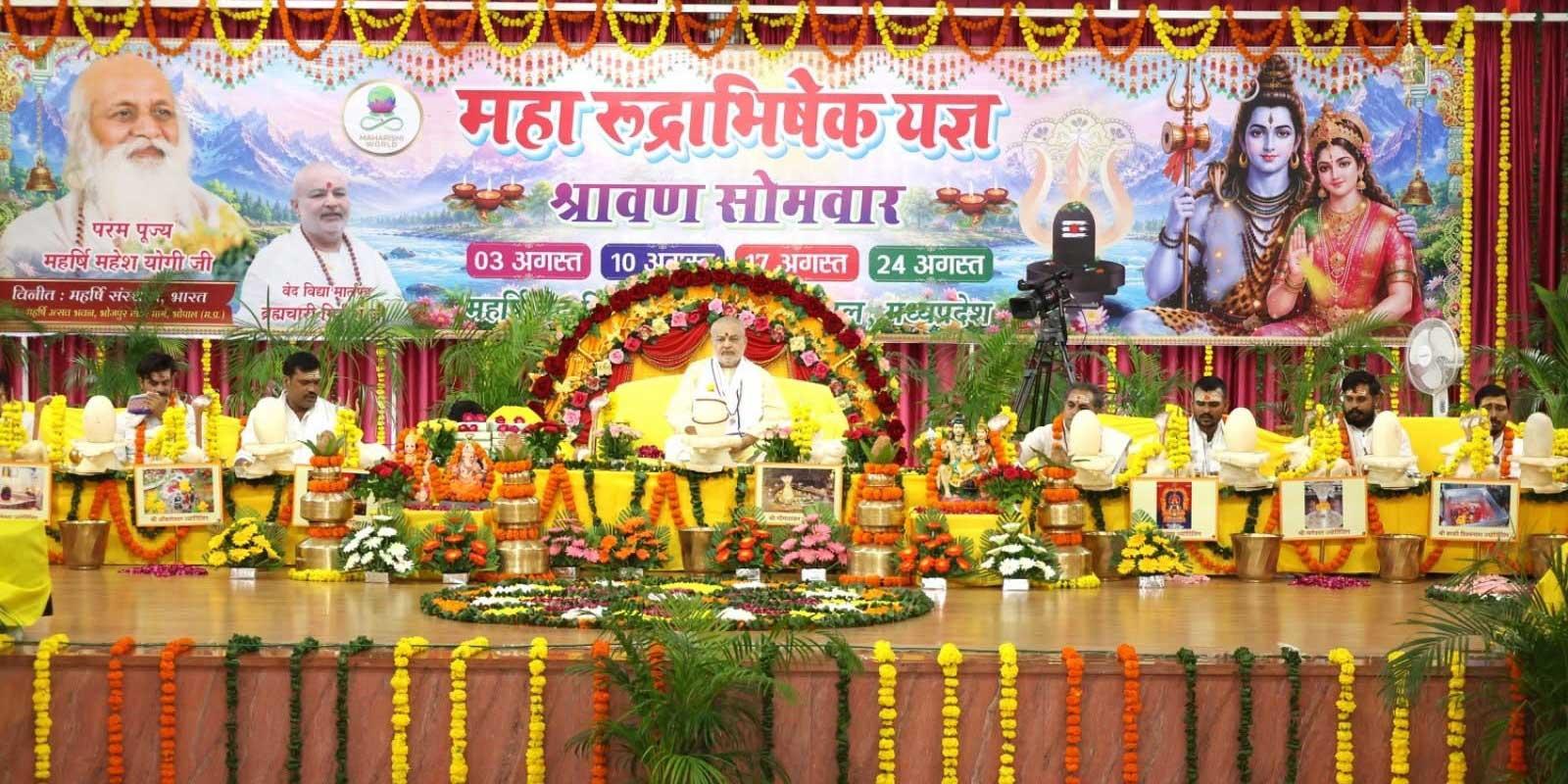 Ved Vidya Martand Brahmachari Girish Ji has performed Maharudrabhishek on fourth Shravan Somvar with 121 Maharishi Vedic Pundits and Acharyas with the sankalpa of wellbeing of all dear members of our world family. Heavy rain started with Abhishek and ended on completion. Good oman. Jai Guru Dev, Jai Maharishi, Jai Shiv Shankar Ji.