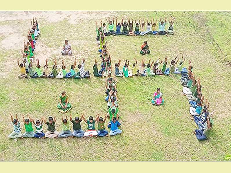 Students of MVM Tiruvannamalai forming 'Swastik' during 
Green Day celebration in school's premises.