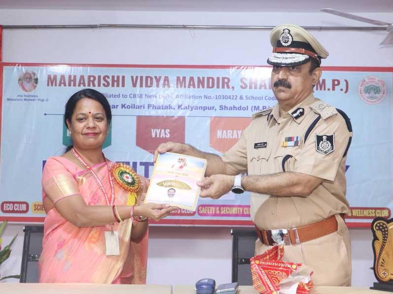 Principal, MVM Shahdol presented the book 