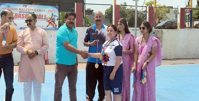 Smt. Madhu Sharma, PGT, MVM Jammu got the gold medal in 7th National Masters Games Basketball held in Dharamshalla in 40 plus 
Category.
